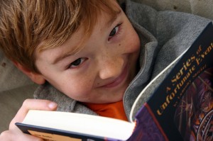 A little boy looking at the camera