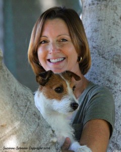 Susan Stoltz holding a dog