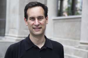 David Levithan standing in front of a building