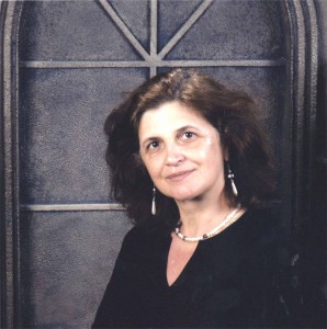 Mirela Roznoveanu standing in front of a door