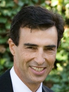 Daniel E. Friedmann wearing a suit and tie