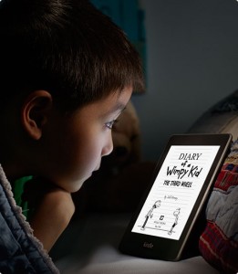 Kindle-kid. | The Children's Book Review A young boy looking at the camera