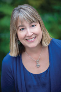 A woman in a blue shirt