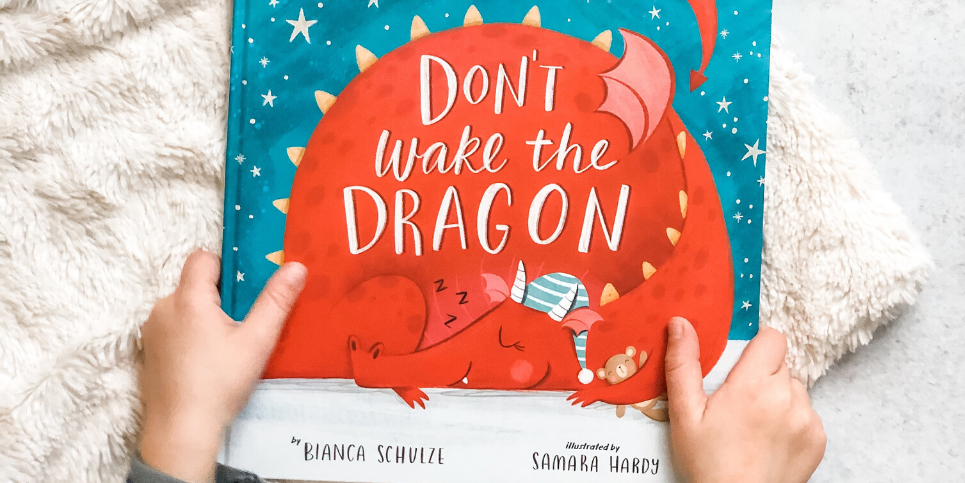 Child Holding Don't Wake the Dragon