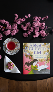 A Most Clever Girl Flatlay Email | The Children's Book Review