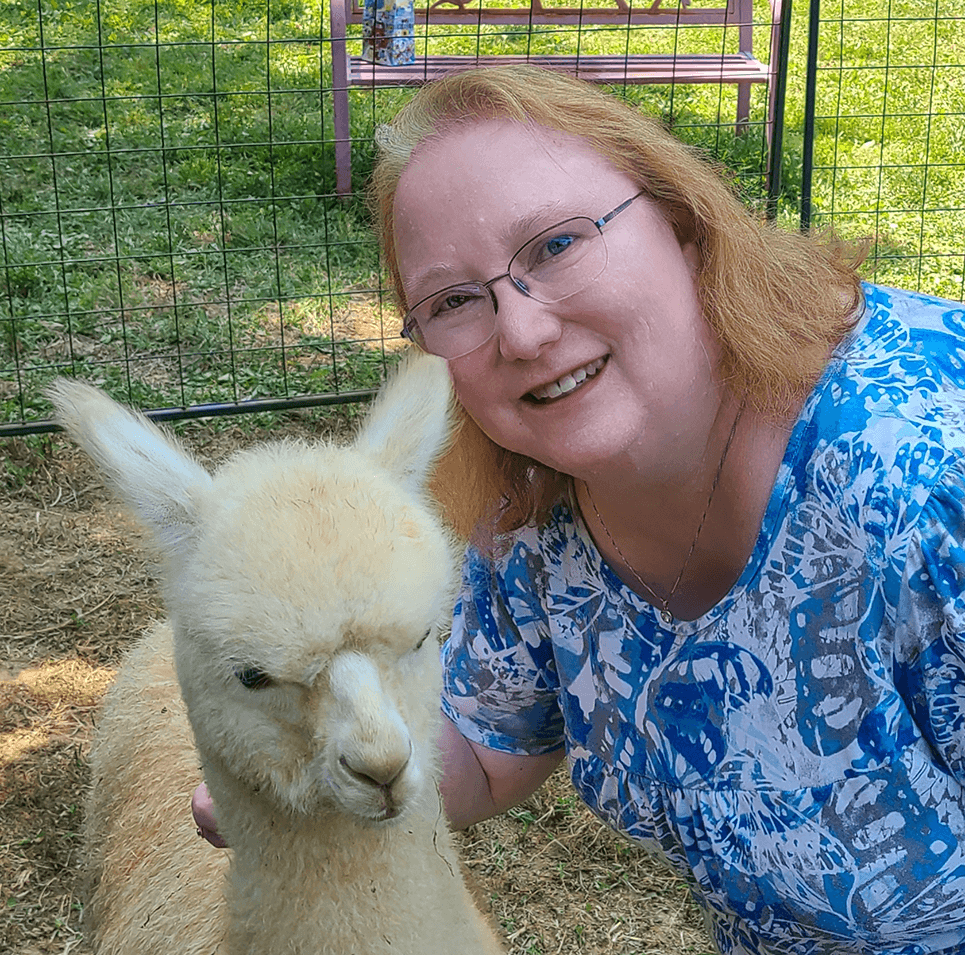 Tammy Fortune with an alpaca.