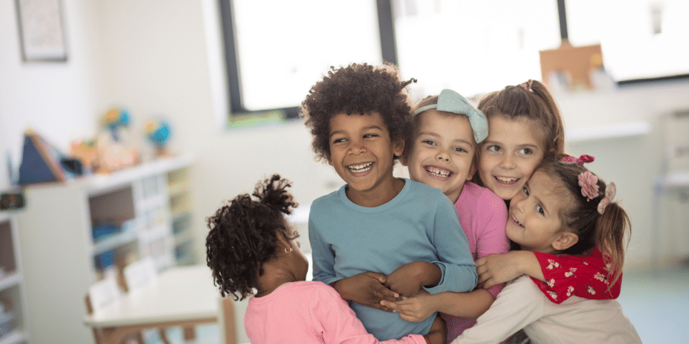 Kids Hugging: Make Connections Purpose for Listening