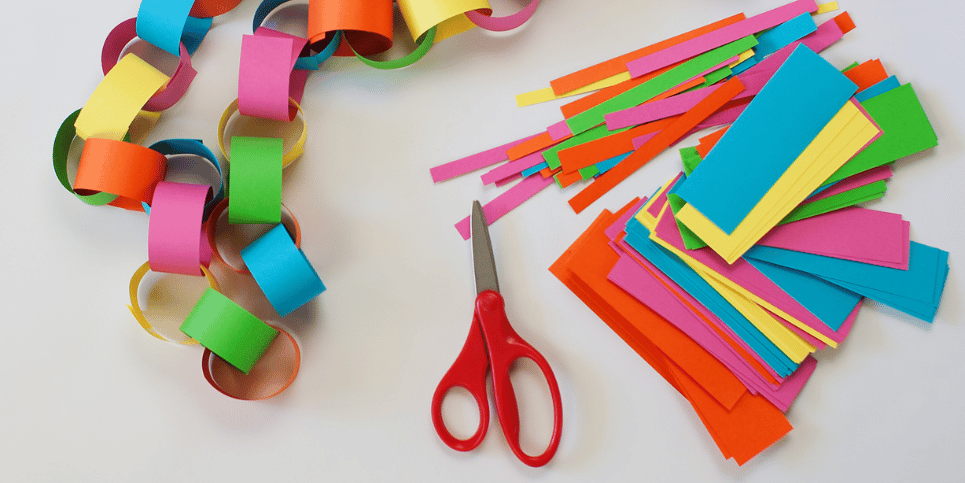 Paper chain with scissors and paper.