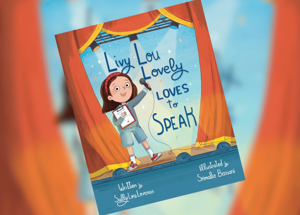 Illustrated children's book cover showing a girl on stage holding a microphone under orange curtains, title Lily Lou Lovely Loves to Speak on a blue backdrop.