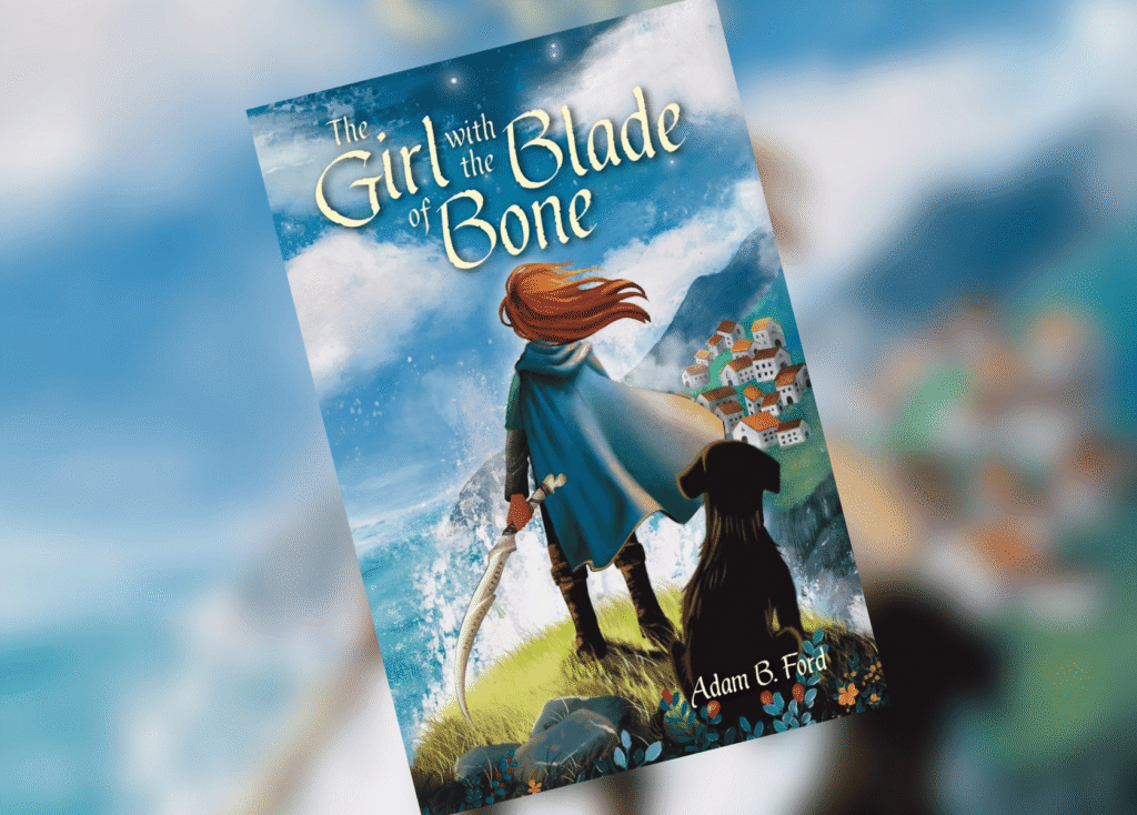 The Girl with the Blade of Bone Header | The Children's Book Review Book cover illustrating a fantasy scene: a girl with red hair and blue cape stands on a cliff with a sword, overlooking a coastal village and wild waves.