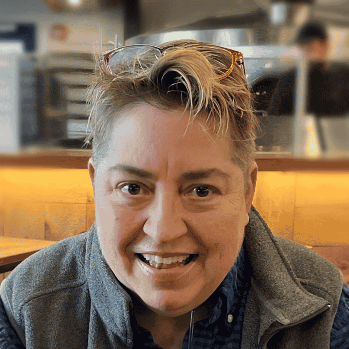 Author headshot of Holly Valero