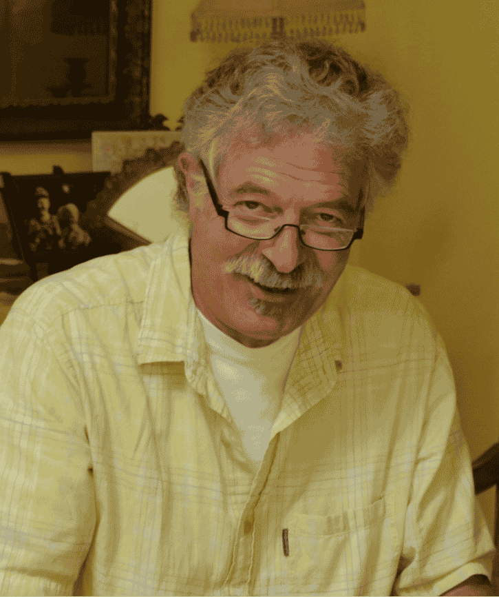 Author headshot of S.R. Schechter